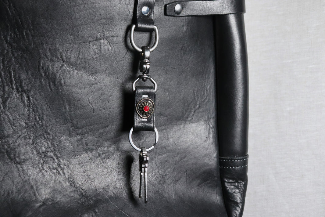 image IDX - red emblem keychain